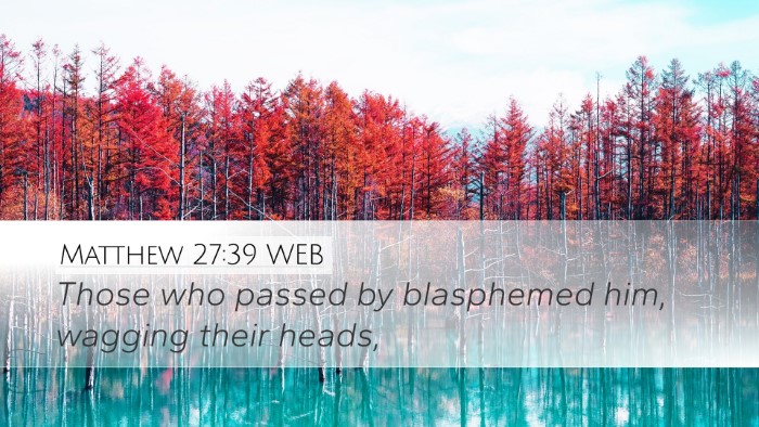 Matthew 27:39 WEB Bible Verse Image