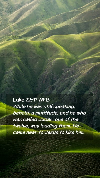 Picture 02 - Luke 22:47 WEB Mobile Phone Wallpaper - While he was still speaking, behold, a multitude, - Mobile Bible Verse Wallpaper