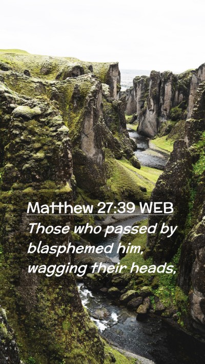 Picture 02 - Matthew 27:39 WEB Mobile Phone Wallpaper - Those who passed by blasphemed him, wagging their - Mobile Bible Verse Wallpaper