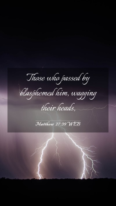 Picture 03 - Matthew 27:39 WEB Mobile Phone Wallpaper - Those who passed by blasphemed him, wagging their - Mobile Bible Verse Wallpaper
